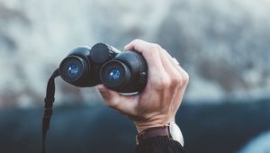 Preview wallpaper binoculars, hand, watch, focus