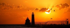 Preview wallpaper bird, sunset, lighthouse