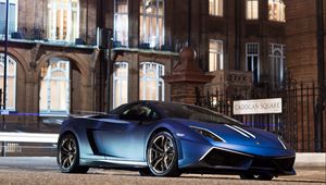 Preview wallpaper blue, sign, city, lamborghini