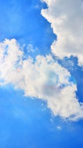 Preview wallpaper blue sky, sun, light, clouds, day, air
