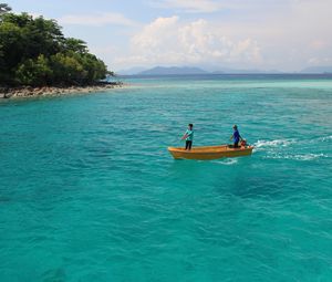 Preview wallpaper blue water, boat, children, thailand, island