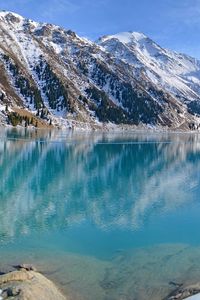 Preview wallpaper blue water, lake, mountains, winter, snow, freshness