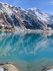 Preview wallpaper blue water, lake, mountains, winter, snow, freshness