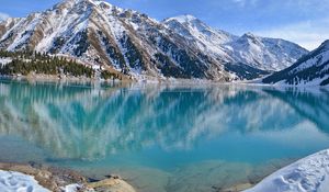 Preview wallpaper blue water, lake, mountains, winter, snow, freshness