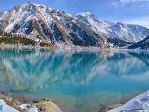 Preview wallpaper blue water, lake, mountains, winter, snow, freshness