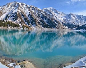 Preview wallpaper blue water, lake, mountains, winter, snow, freshness