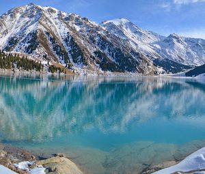 Preview wallpaper blue water, lake, mountains, winter, snow, freshness