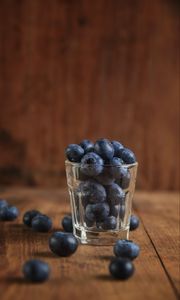 Preview wallpaper blueberry, berry, glass, wooden, surface