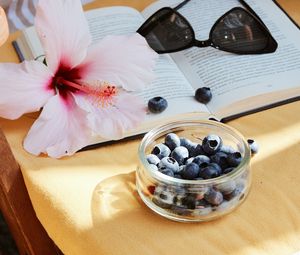 Preview wallpaper blueberry, flower, berry, book, glasses