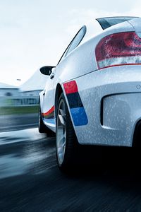 Preview wallpaper bmw 1-series m coupe, bmw, car, white, wet, rear view, speed