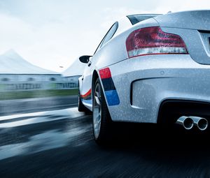 Preview wallpaper bmw 1-series m coupe, bmw, car, white, wet, rear view, speed