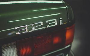 Preview wallpaper bmw 323i, car, green, taillight, number
