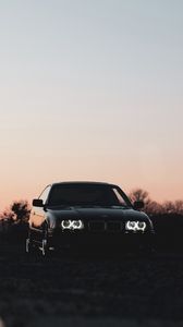 Preview wallpaper bmw, car, black, headlights, light, twilight