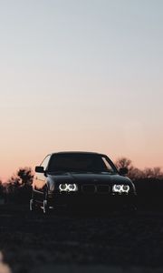 Preview wallpaper bmw, car, black, headlights, light, twilight