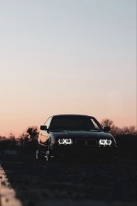 Preview wallpaper bmw, car, black, headlights, light, twilight