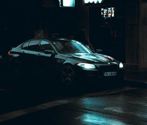 Preview wallpaper bmw, car, black, wet, dark