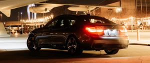 Preview wallpaper bmw, car, black, tailights, light, airplane