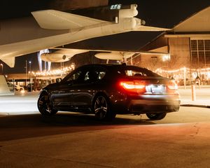 Preview wallpaper bmw, car, black, tailights, light, airplane