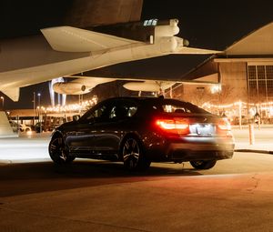 Preview wallpaper bmw, car, black, tailights, light, airplane