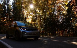 Preview wallpaper bmw, car, front view, motion, autumn, trees