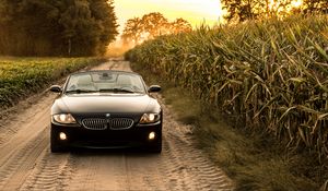 Preview wallpaper bmw, car, front view, headlight, road