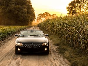 Preview wallpaper bmw, car, front view, headlight, road