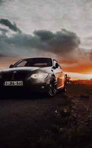 Preview wallpaper bmw, car, front view, headlights, glow, black