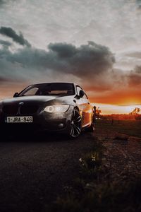 Preview wallpaper bmw, car, front view, headlights, glow, black