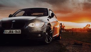 Preview wallpaper bmw, car, front view, headlights, glow, black