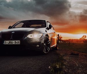 Preview wallpaper bmw, car, front view, headlights, glow, black