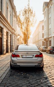 Preview wallpaper bmw, car, gray, rear view, street