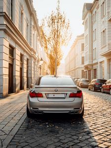 Preview wallpaper bmw, car, gray, rear view, street