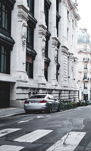 Preview wallpaper bmw, car, gray, parking, road, buildings