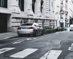Preview wallpaper bmw, car, gray, parking, road, buildings