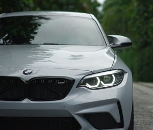 Preview wallpaper bmw, car, gray, road, front view