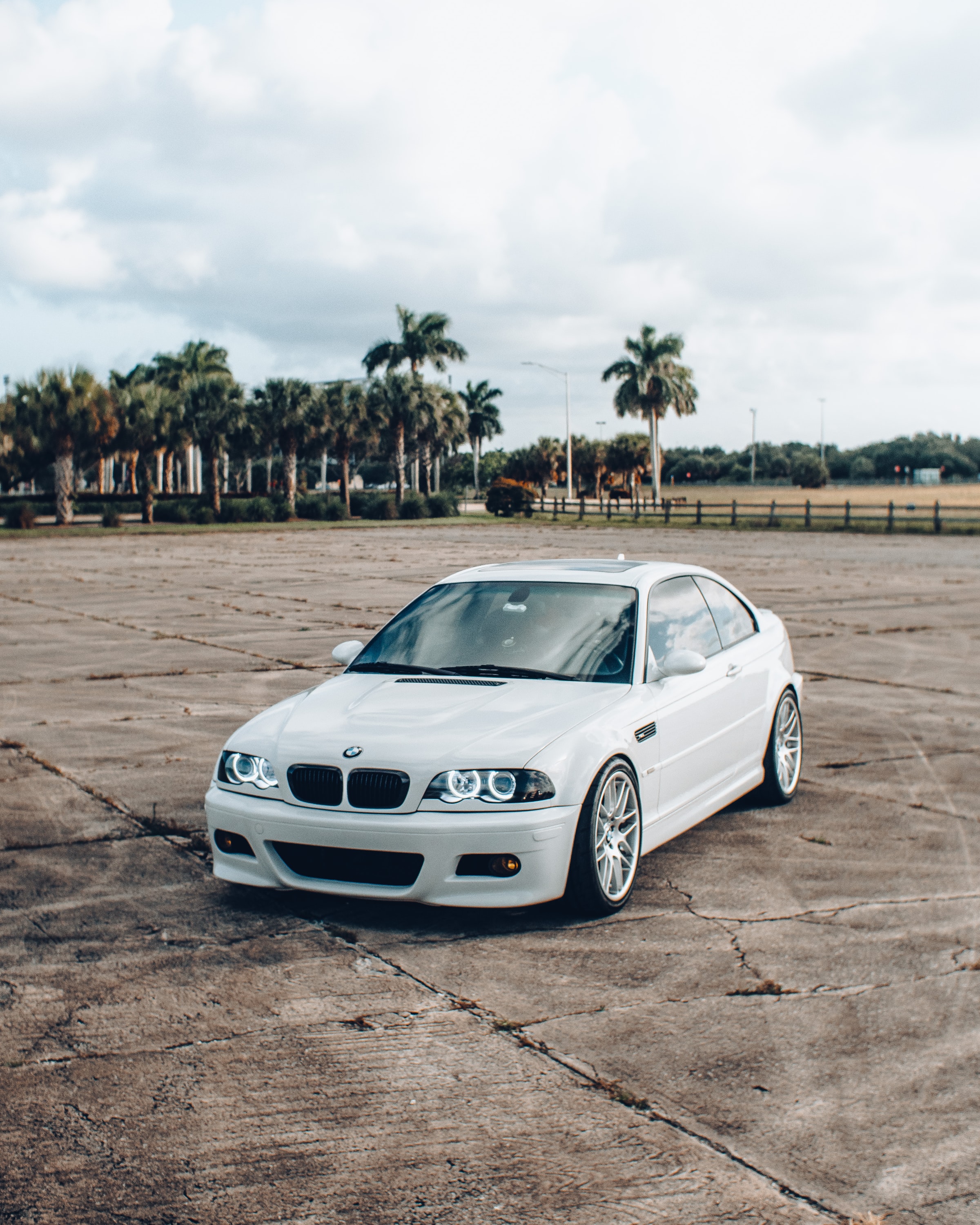 Download wallpaper 2400x3000 bmw, car, headlights, glow, white hd