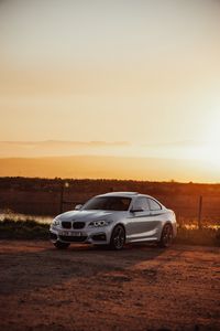 Preview wallpaper bmw, car, side view, gray, sunset