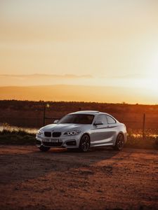 Preview wallpaper bmw, car, side view, gray, sunset