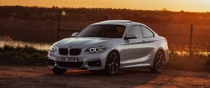 Preview wallpaper bmw, car, side view, gray, sunset