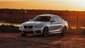 Preview wallpaper bmw, car, side view, gray, sunset