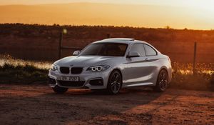 Preview wallpaper bmw, car, side view, gray, sunset