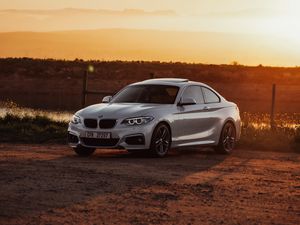 Preview wallpaper bmw, car, side view, gray, sunset