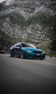 Preview wallpaper bmw, car, side view, road, rock