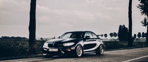 Preview wallpaper bmw, car, spoiler, black, road