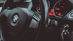 Preview wallpaper bmw, car, steering wheel, speedometer