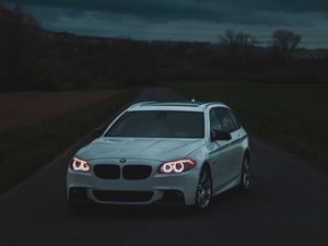 Preview wallpaper bmw, car, white, road, twilight