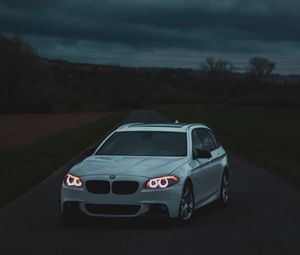 Preview wallpaper bmw, car, white, road, twilight