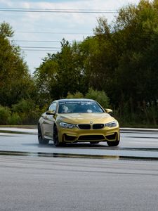 Preview wallpaper bmw, car, yellow, road