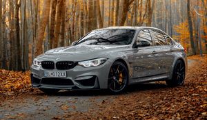 Preview wallpaper bmw m3, bmw, car, gray, side view, forest, autumn