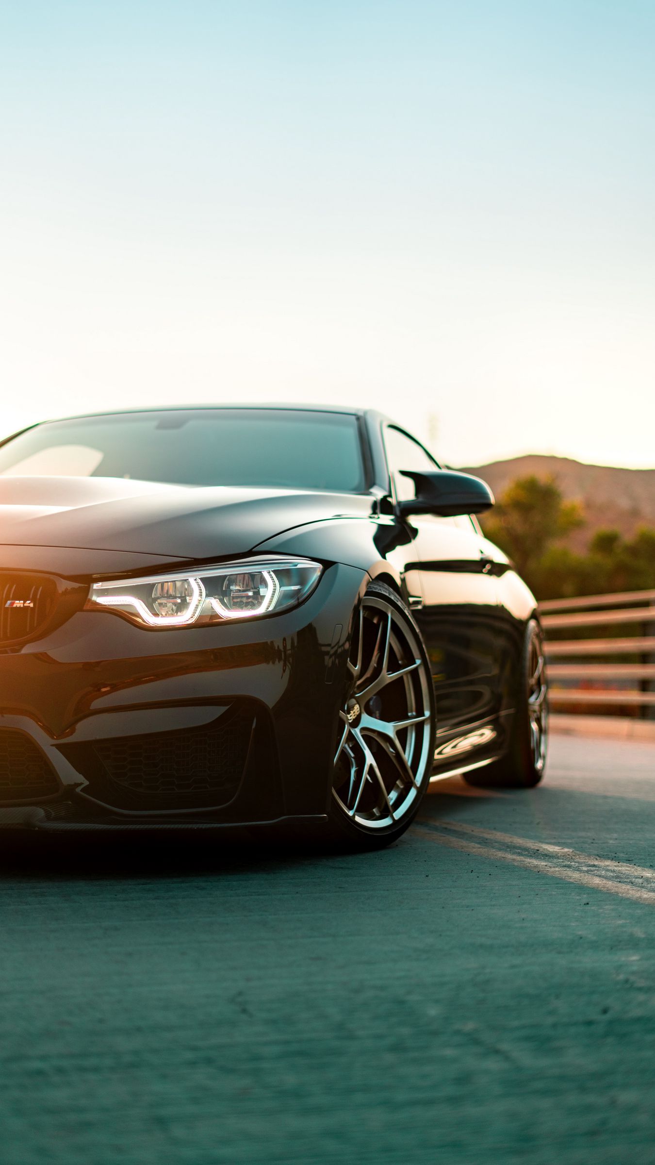 Download wallpaper 1350x2400 bmw m4, bmw, car, front view, headlight, black  iphone 8+/7+/6s+/6+ for parallax hd background